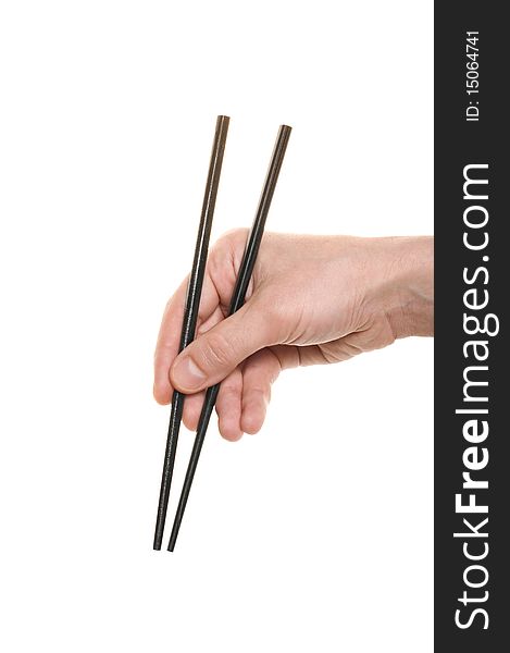 Hand with a chopsticks isolated over white