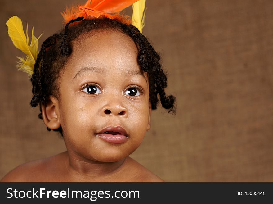 Closeup portrait of toddler with a sullen expression. Closeup portrait of toddler with a sullen expression