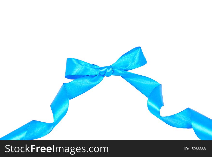 Isolated blue bow with a ribbon on white