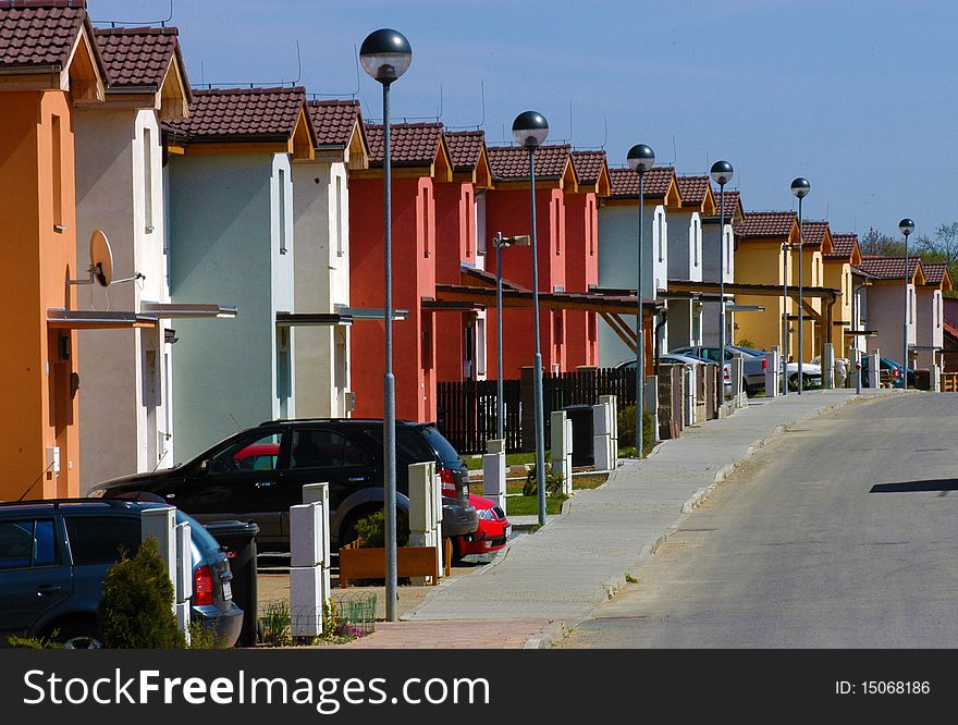 Raw ofwhite red and yellowl houses. Raw ofwhite red and yellowl houses
