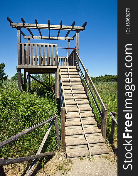 Lookout tower for birdwatching near a lake