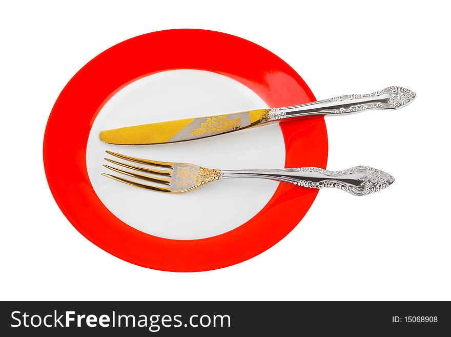 Plate, knife and fork isolated on white background