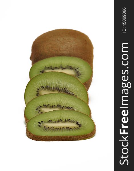 Natural colored kiwi slices against a white background. Natural colored kiwi slices against a white background