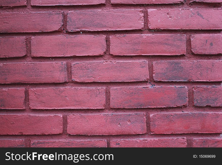 Brick wall that is painted red. Brick wall that is painted red.