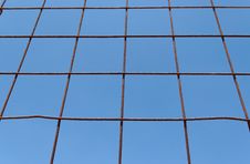 Converging View Of Rusty Lattice On Sky Background Stock Photography