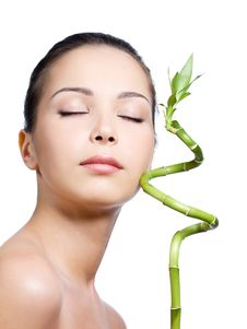 Woman With Closed Eyes With Plant Stock Photos Woman With Closed Eyes With Plant Stock Photos