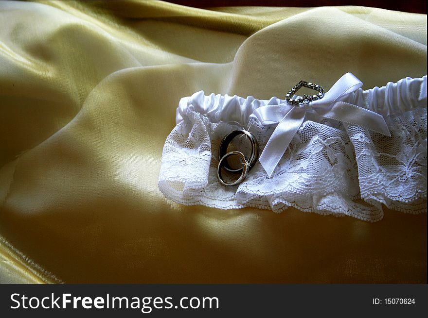 Wedding rings and garter