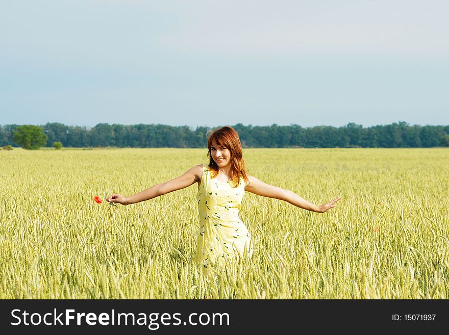 Happy girl smiling in field. Happy girl smiling in field