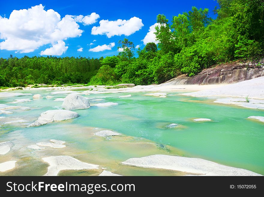 Scenic view of mountain river at sunny day