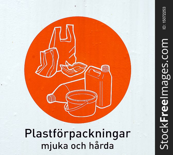 Recycling sign in orange colour