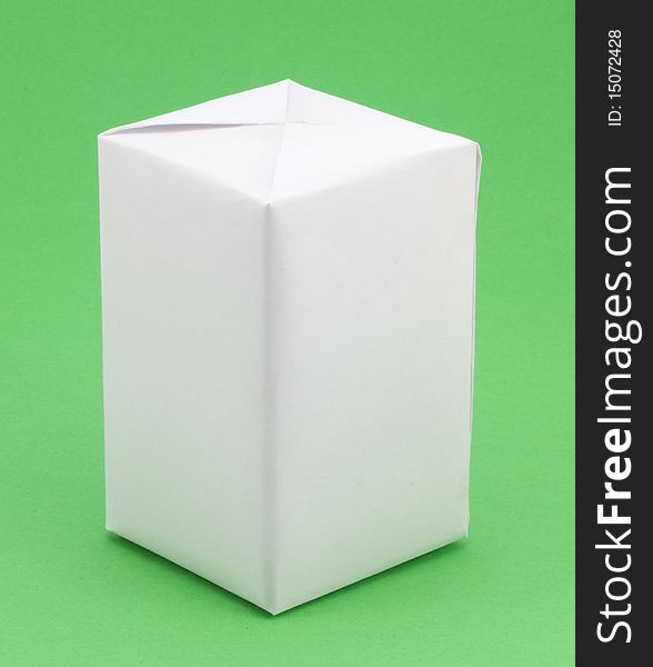 White gift box on a green background