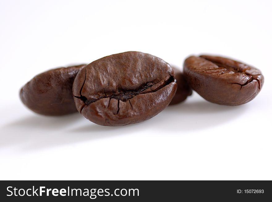 Four Coffee beans shot on the white background