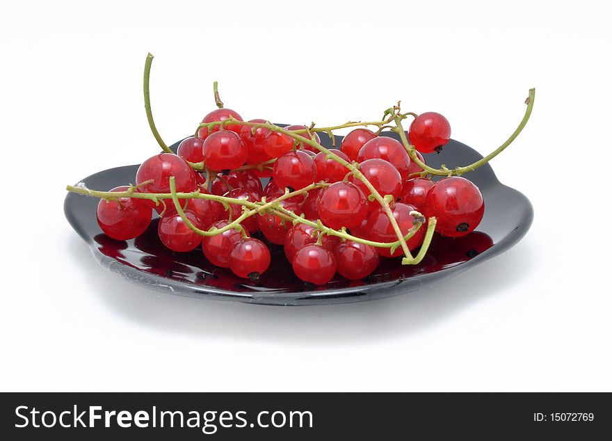 Picture of clusters of red currant on a white background