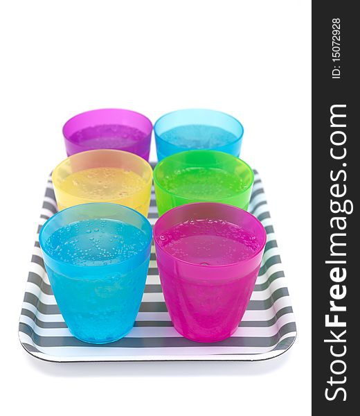 Drinks on a serving tray isolated against a white background. Drinks on a serving tray isolated against a white background