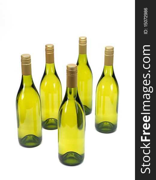Bottles of white wine isolated against a white background