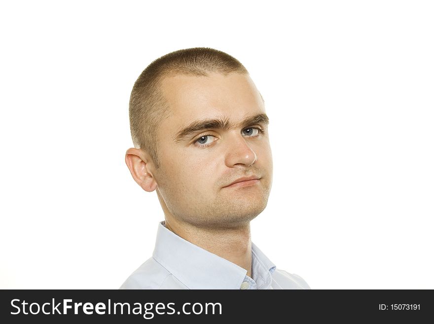 Young man from a businessman in a blue shirt on a white background. Young man from a businessman in a blue shirt on a white background