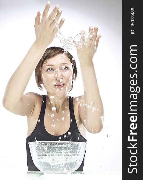 Young woman playing with water. Young woman playing with water