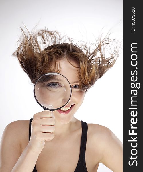 WOMAN WITH MAGNIFIER