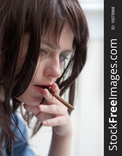 Depressed Brunette Girl With Cigar