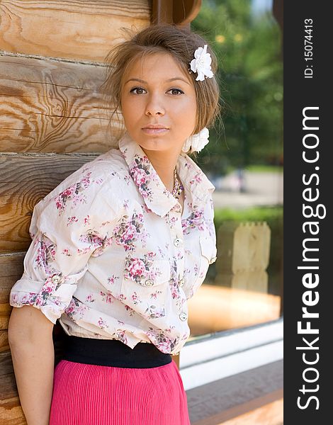 Girl standing on a veranda. Girl standing on a veranda