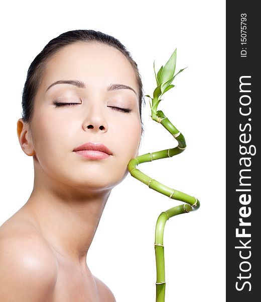 Woman With Closed Eyes With Plant