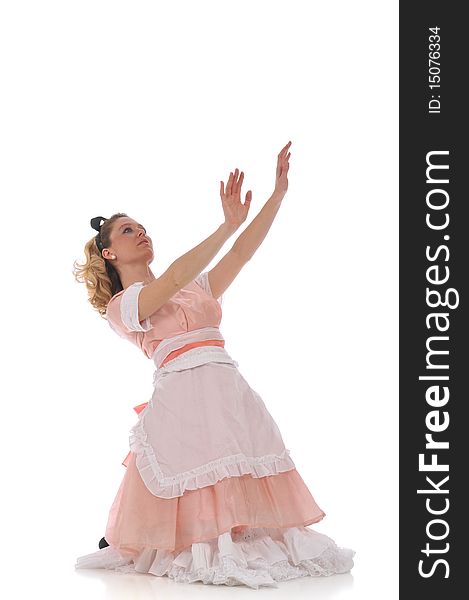 Ballerina wearing a pink dress and isolated on a white background. Ballerina wearing a pink dress and isolated on a white background