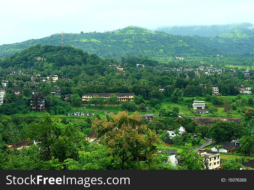 A beautiful and colorful landscape scene with mixture of urban and rural locality. A beautiful and colorful landscape scene with mixture of urban and rural locality.