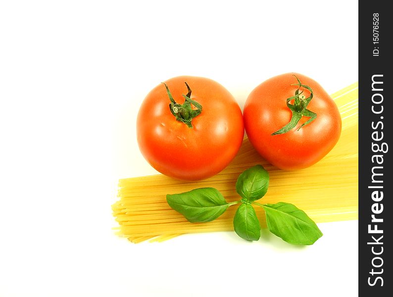 Tomato, basil and pasta isolated on white background. Tomato, basil and pasta isolated on white background