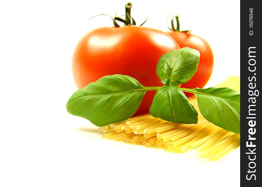 Tomato with basil and pasta for spaghetti. Tomato with basil and pasta for spaghetti