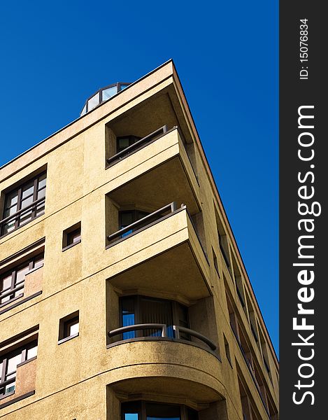 Modern apartments on the clear sky background