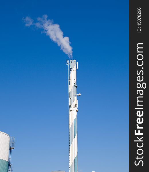 Factory plant building with a chimney modern industry background vertical. Factory plant building with a chimney modern industry background vertical