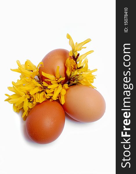 Easter egg decoration with brown and yellow flowers. Easter egg decoration with brown and yellow flowers