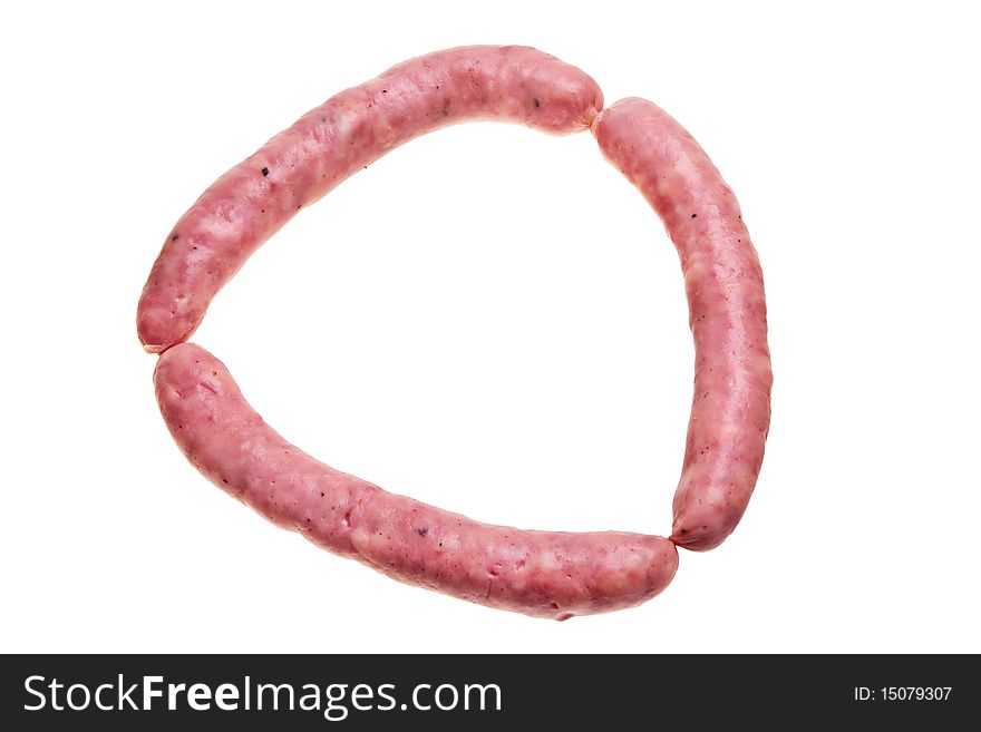 Tasty garlic sausage pieces isolated over white background. Tasty garlic sausage pieces isolated over white background.