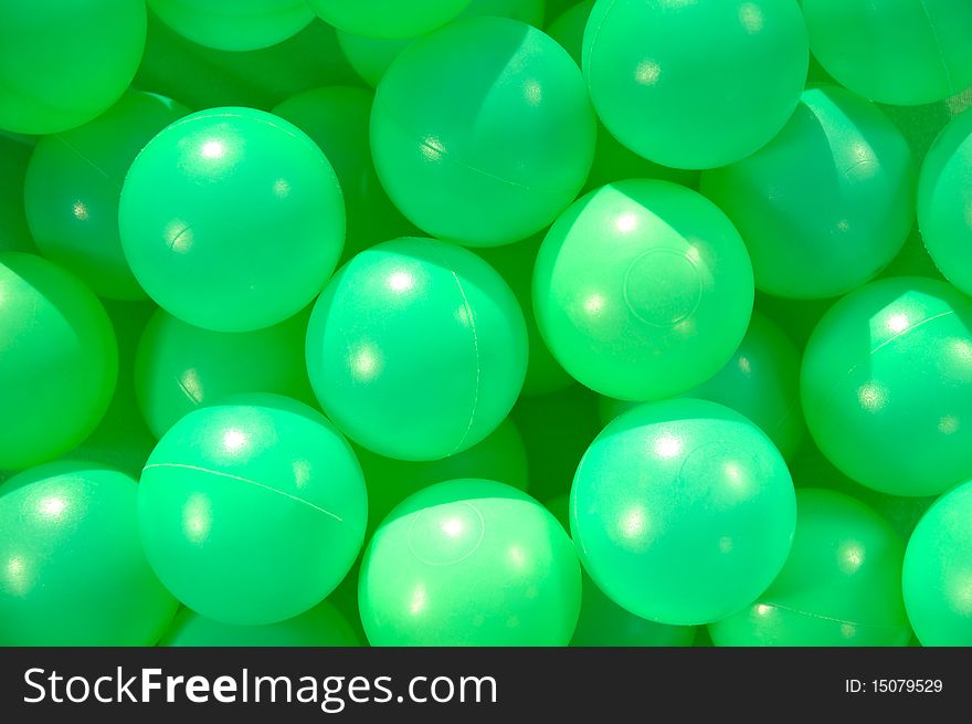 Prepare green funny plastic balls. Prepare green funny plastic balls