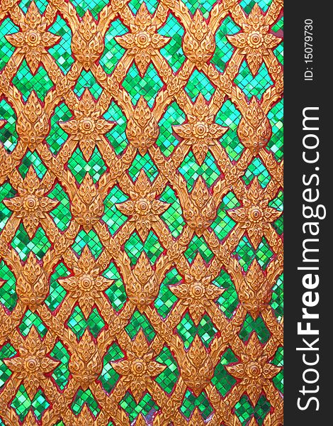 Traditional Thai art  pattern, molding with green glass technique.