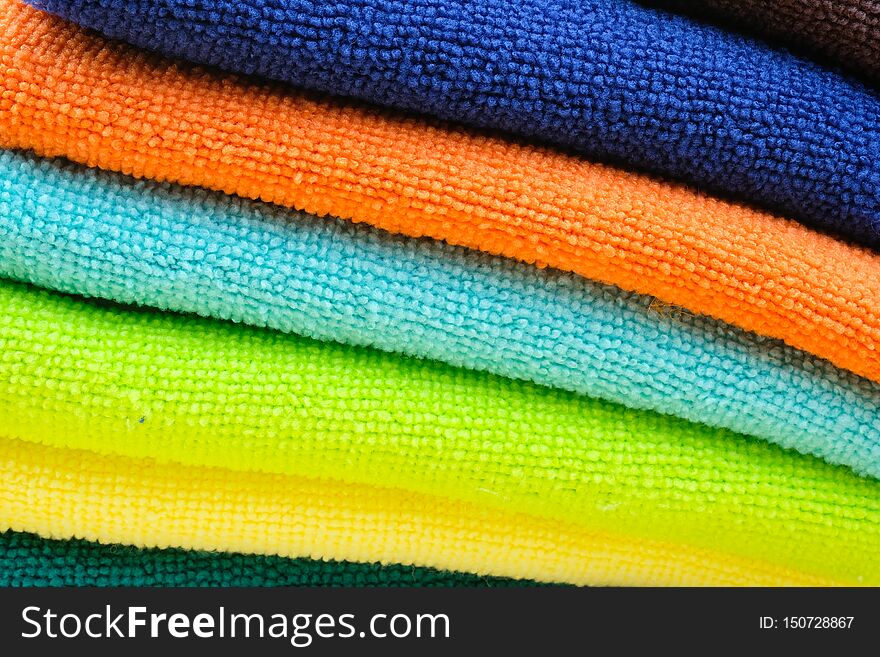 Stack of multicolored bath towels