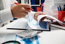 Businessman Working And Calculating, Reads And Writes Reports. Office Employee, Table Closeup. Business Financial Accounting Stock Images