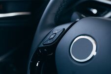 Audio Control Buttons On The Steering Wheel Of A Modern Car Royalty Free Stock Photos