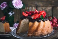 Summer Cake With Chocolate Glaze And Fresh Strawberries Stock Photo