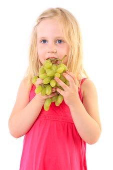 Little Baby Girl Eats The Big Grapes Royalty Free Stock Photography Little Baby Girl Eats The Big Grapes Royalty Free Stock Photography