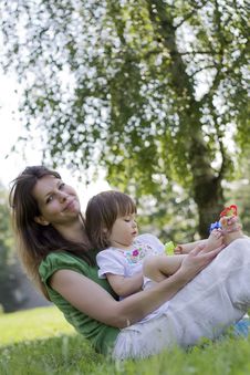 Mother Playing With Her Little Daughter In Park Royalty Free Stock Images Mother Playing With Her Little Daughter In Park Royalty Free Stock Images