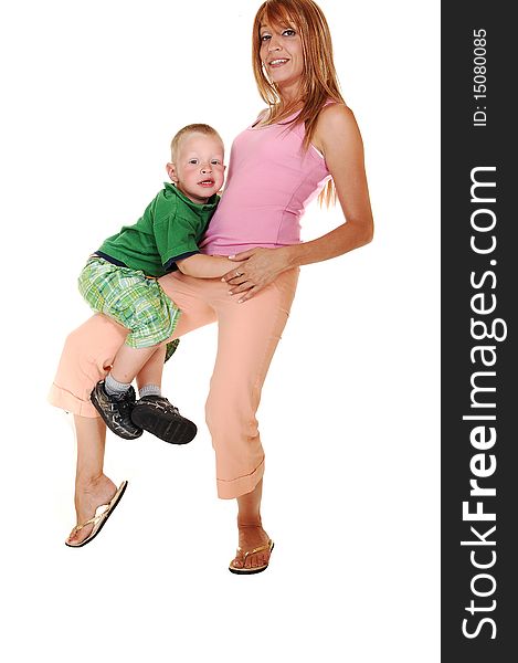 A young pretty mother playing with her small son in the studio for white background. A young pretty mother playing with her small son in the studio for white background.