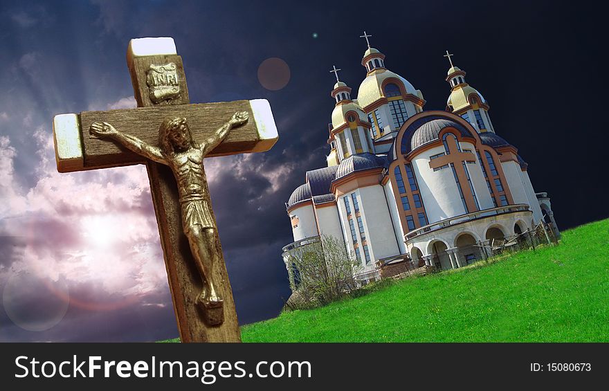 Crucifix against a background of church in the evening