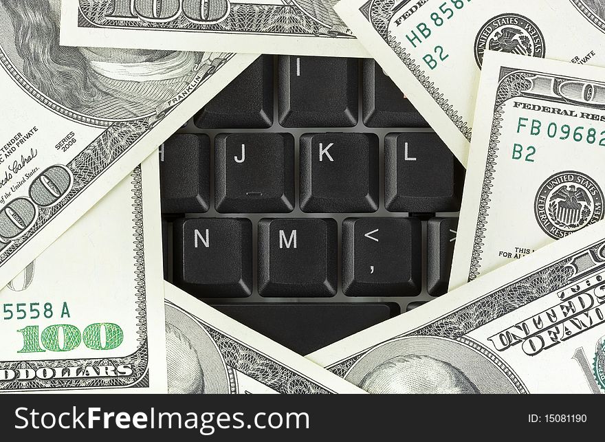 Computer keyboard and money - concept business background