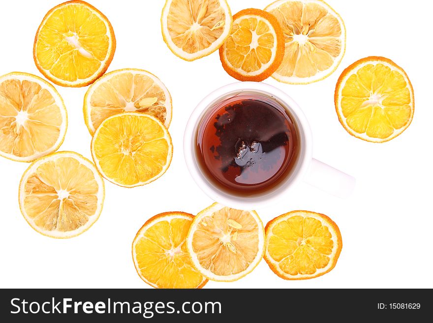 Cup of tea and dried fruits on white (isolated, clipping path)