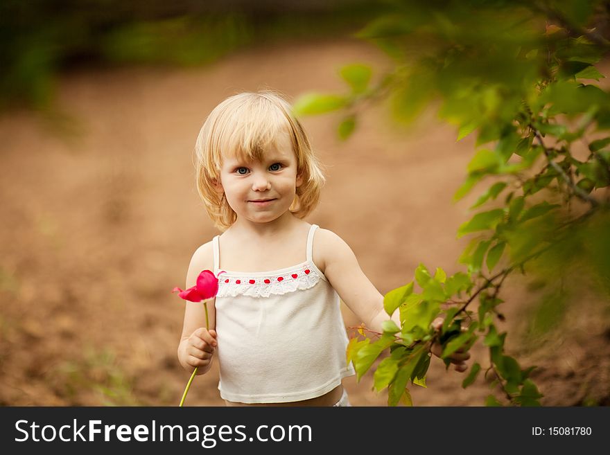 Happy girl with tulip