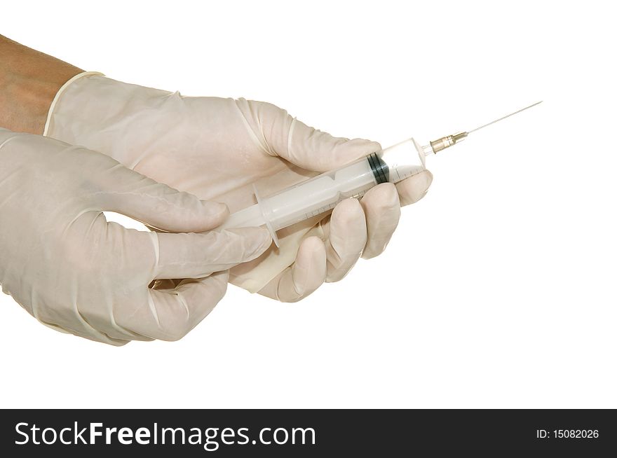 Syringe in his hand on a white background