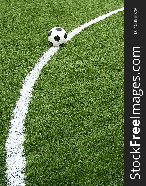 Football On Soccer Field With Curve Line