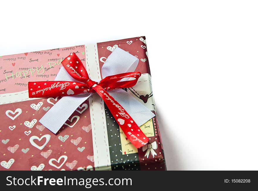 Gift box with ribbon isolated on white background