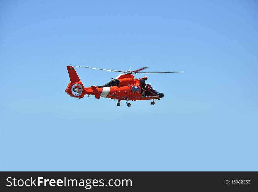 A rescue helicopter against the blue sky